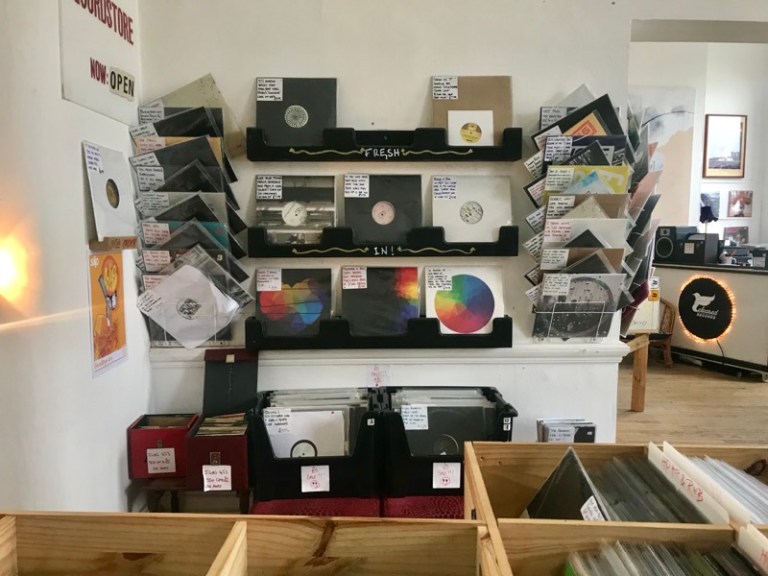 A landscape picture of a selection of vinyls on sale at Released Records